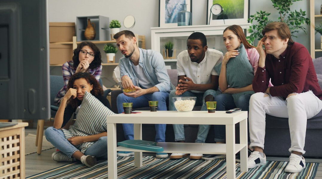 group watching tv show