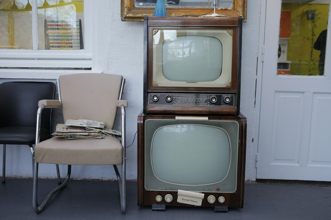actor on vintage television set
